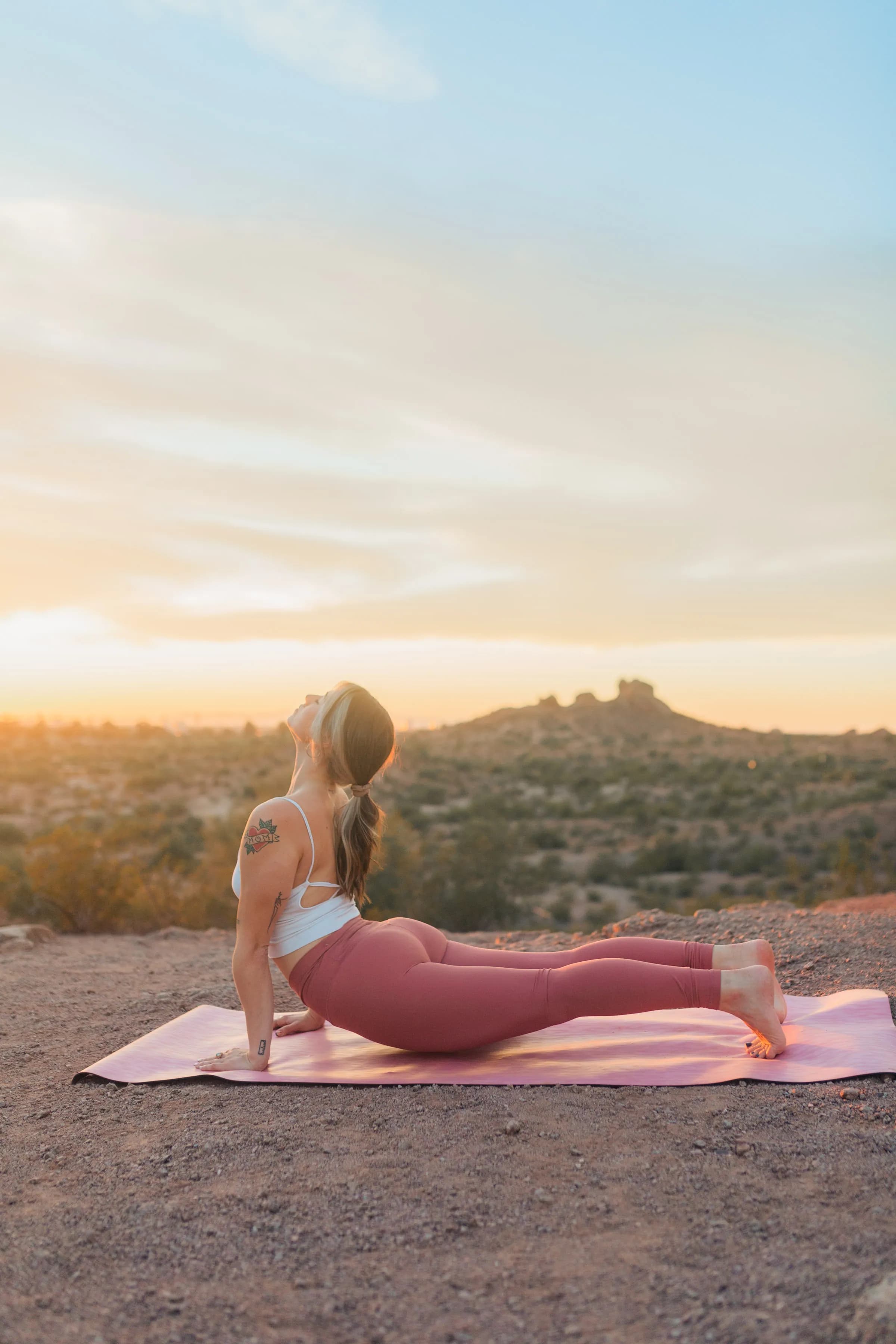 Sunrise yoga on a desert trail